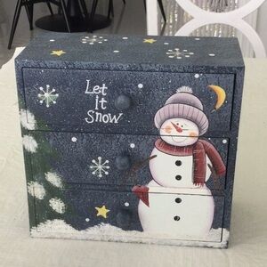 Home a Snowman Box with drawers that pull out. It is Cute